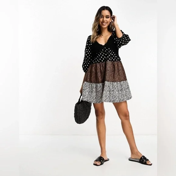asos design mixed print tiered babydoll mini dress ASOS DESIGN crochet tiered babydoll mini dress in mixed animal print